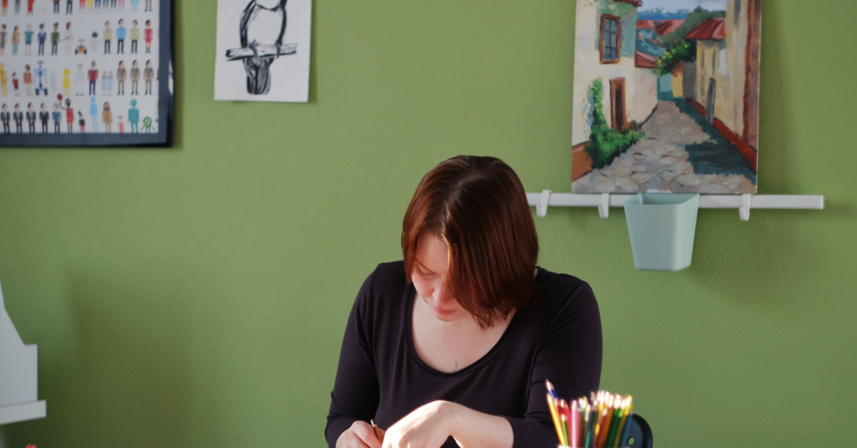 Teacher preparing a lesson.  Photo by Aleksandra Sapozhnikova on Unsplash.com