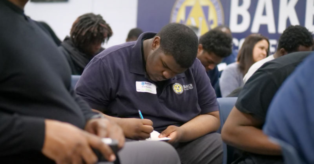 Black boy journaling at school. Photo courtesy of Noble Schools.